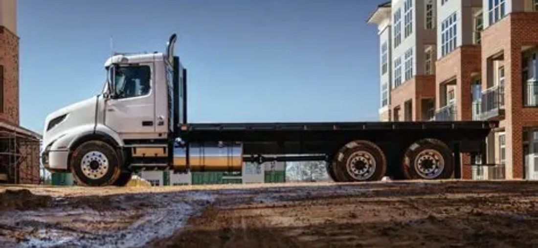 Flatbed truck used for equipment haulage