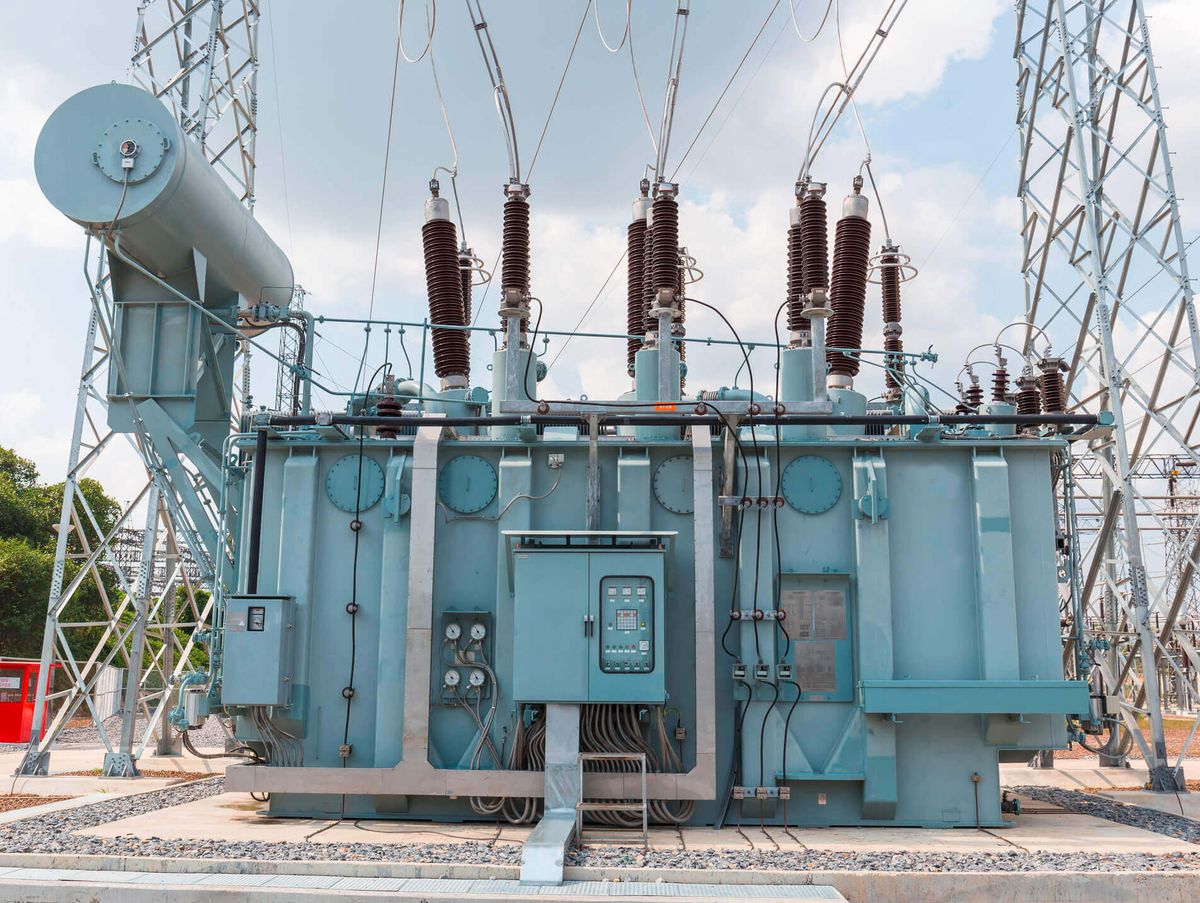 High-voltage power transformer and switchgear at a substation